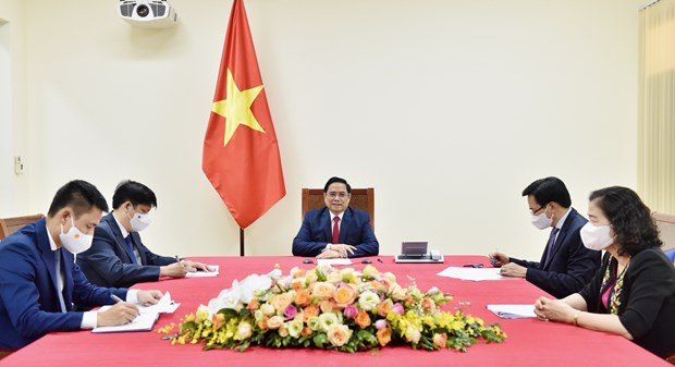 Prime Minister Pham Minh Chinh holds phone talks with WHO Director-General Tedros Adhanom Ghebreyesus. Photo: VNA