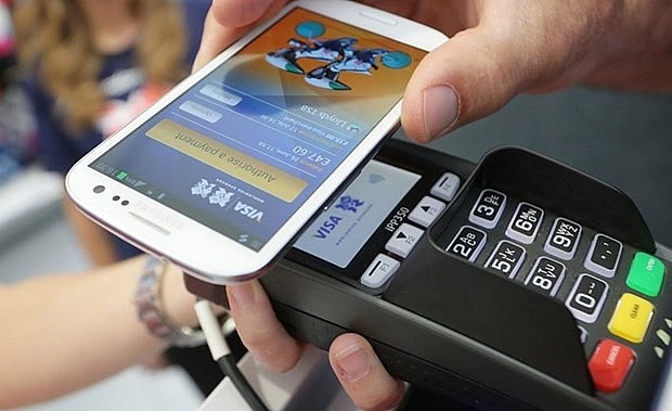 A type of cashless payment. Photo: VNA