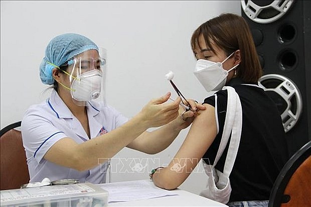 Vaccination against COVID-19 in Ho Chi Minh City. Photo: VNA