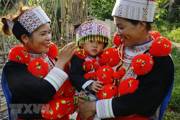 Unique Traditional Costumes of Red Dao People