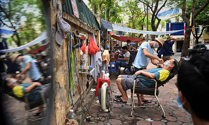 vietnam news today july 13 hanoi shuts down indoor restaurants cafes barbershops again