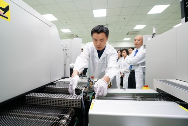 An engineer monitors a production line at a circuit board factory at the Da Nang IT Park. The central city's IZs and IPs have still lured investment in spite of the coronavirus outbreak. Photo: Trung Nam Group