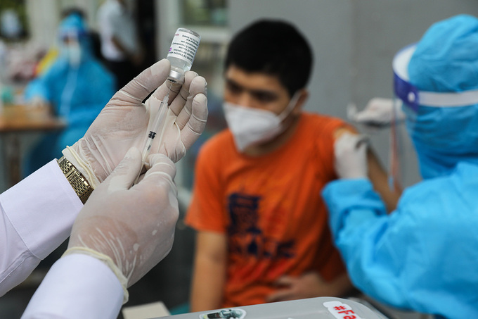 foreigners get early vaccinations in ho chi minh city