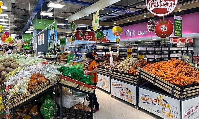 Well stocked vegetable shelves at a supermarket in HCMC. Photo: VnExpress