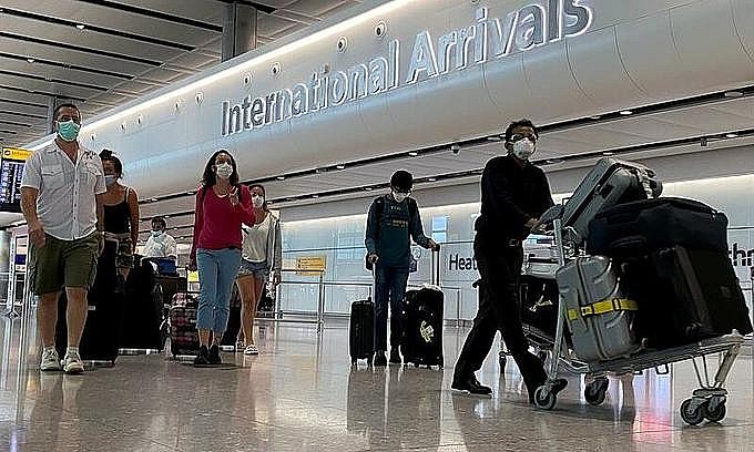 Passengers arrive at Heathrow Airport in London, England, July 29, 2020. Photo: Reuters