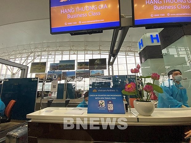 A checkin booth of Vietnam Airlines at an airport. Photo: VNA