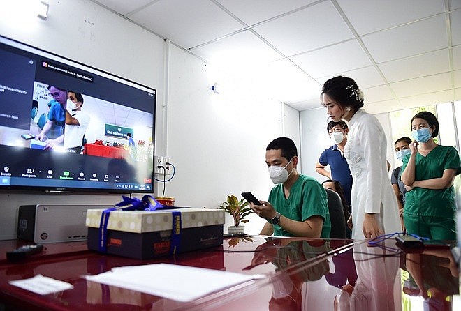 Love in Times of Covid: HCMC Nurse Attends Virtual Wedding