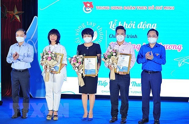 Nguyen Anh Tuan, First Secretary of the Ho Chi Minh Communist Youth Union Central Committee and representatives of organisations at the event. Photo: VNA