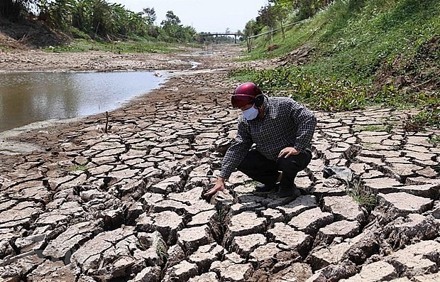 A canal dries up as a result of drought. Photo: VNA