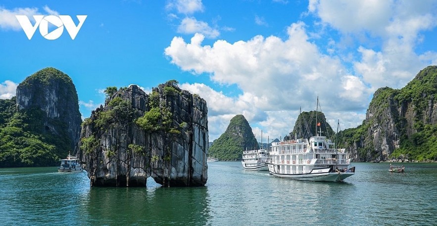 A cruise ship makes a tour of Ha Long Bay, a World Heritage site in northern Vietnam. Photo: VOV