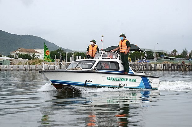 Vietnam's Border Patrol, Fishermen Team Up on the High Seas