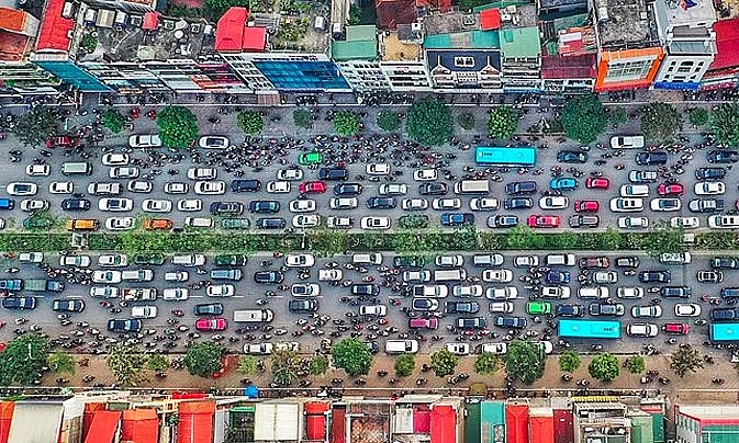 Vehicles run on Hanoi's Xa Dan Street. Photo: VnExpress