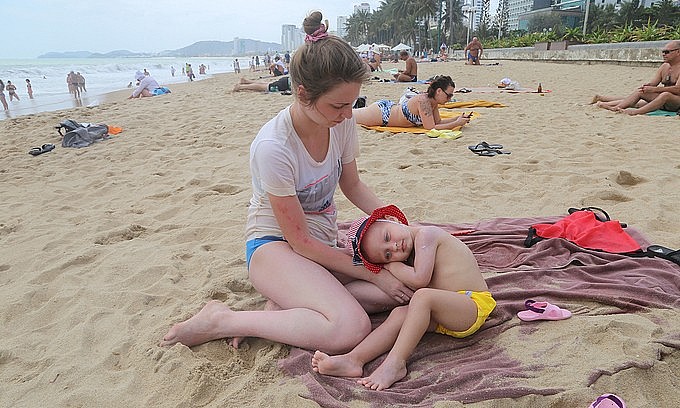 Russian tourists on a beach in Nha Trang, Khanh Hoa Province, February 2020. Photo:  VnExpress