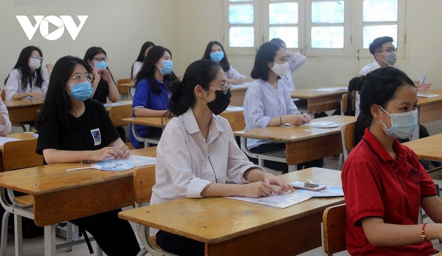 Only Grade 12 students in Hanoi are allowed to attend school again as of December 6. Photo: VOV