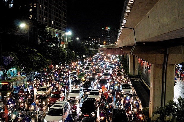 Personal vehicles on a street in Hanoi in the rush hour. Photo: VNA