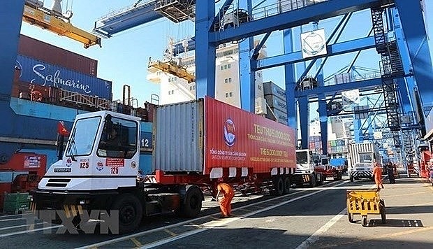 This year, total import-export revenue is estimated at about 660.1 billion USD, up 21 percent year on year, including 331.1 billion USD of exports. Photo: VNA
