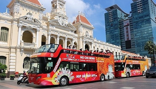 Hop on-hop off bus in HCM City. Photo: VNA