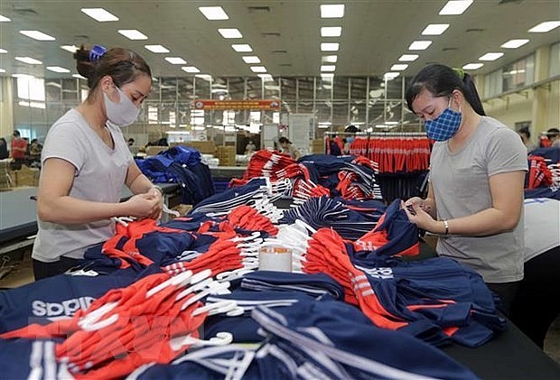 Workers put final touches on garment for export to the EU at a factory in Thai Nguyen province. Photo: VNA