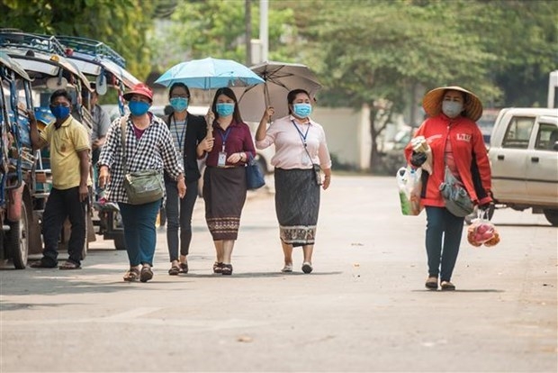 vietnamese in laos advised to obey local regulations on covid 19 prevention and control