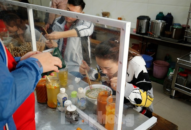 hanoi restaurants install mica barriers as covid 19 prevention