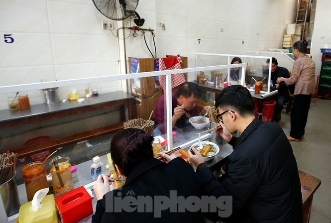 hanoi restaurants install mica barriers as covid 19 prevention