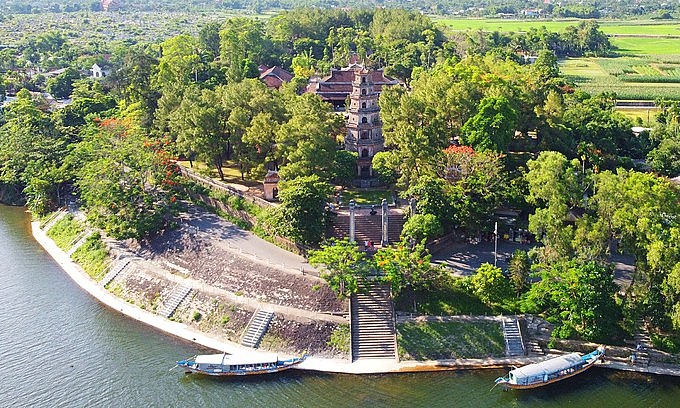 Boats dock in front of Thien Mu Pagoda by the iconic Huong (Perfume) River in Hue, 2020. Photo: VnExpress