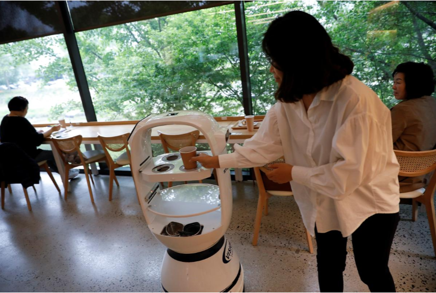 robot baristas reinforce social distancing at south korean cafe