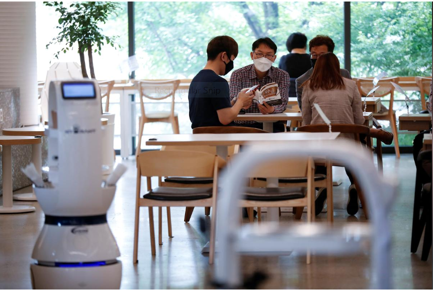 robot baristas reinforce social distancing at south korean cafe