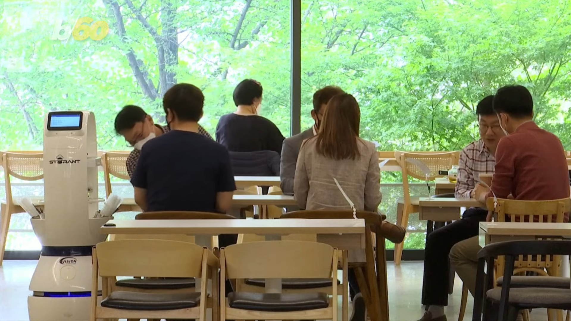 robot baristas reinforce social distancing at south korean cafe