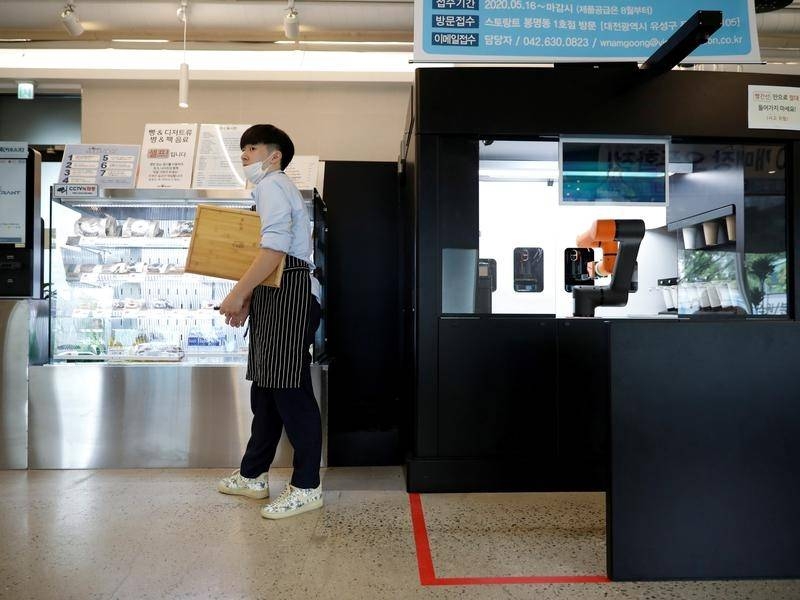 robot baristas reinforce social distancing at south korean cafe
