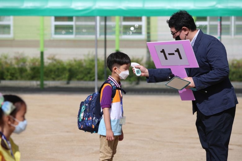 Fear of Covid-19 spikes, South Korea limits number of pupils in schools