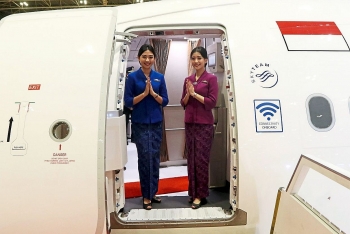 garuda indonesia crew to stop wearing face masks for service with smiles