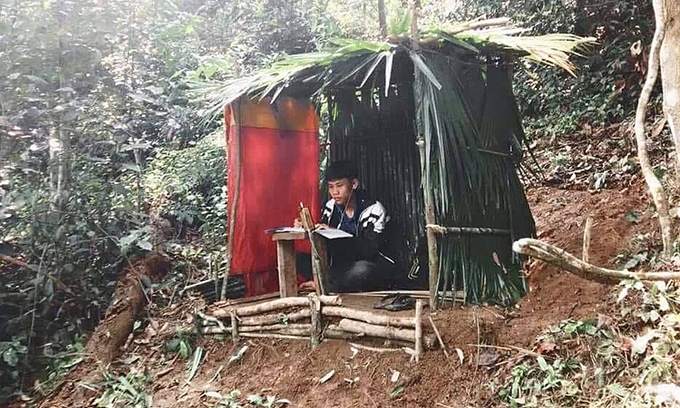 young girl teaches poor children in class under a tree where no internet available