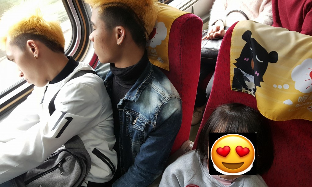 Photo of two Vietnamese migrant workers sharing seat touches hearts in Taiwan