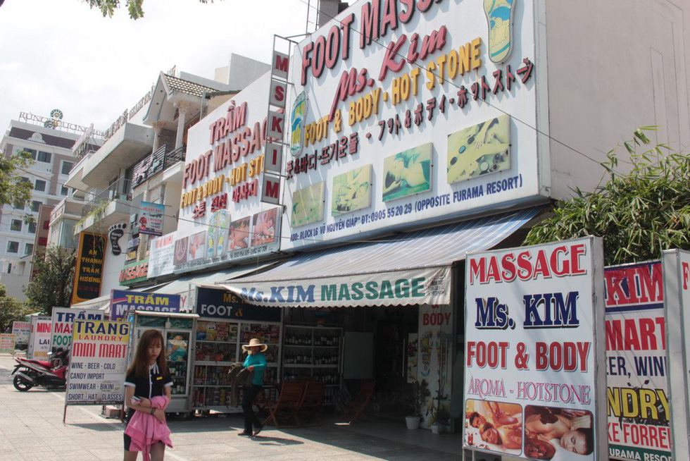 Foreign languages dominate shop signs in Da Nang
