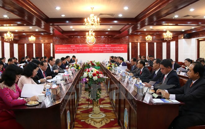 ho chi minh city party committee secretary visits laos