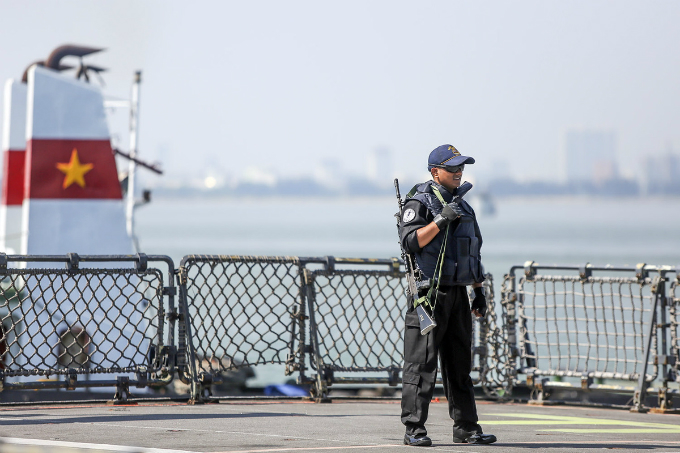 A crew member is on guard on one of the ships. The crews will participate in sport activities and cultural exchanges with officers from the Vietnamese naval team. A joint maritime exercise between the Vietnamese and Indian navies is scheduled on May 25 to wrap up the visit.