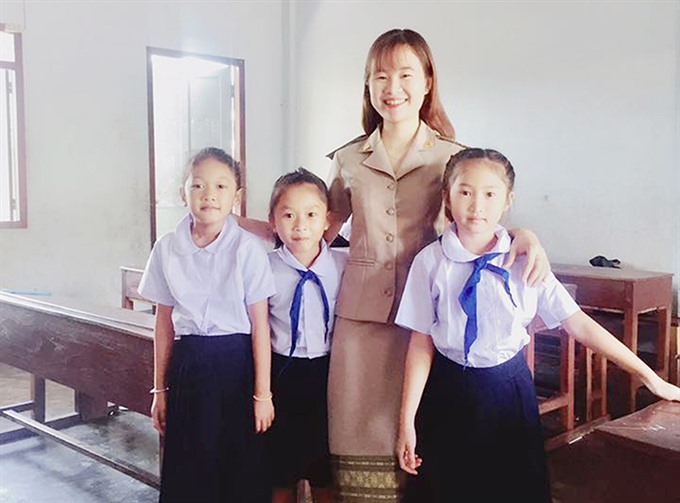 Vietnamese teacher spreads the word in Laos