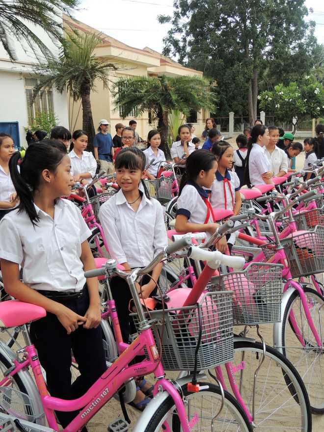 American fifth grader adopted from Vietnam raise money to purchase bikes for girls in home country