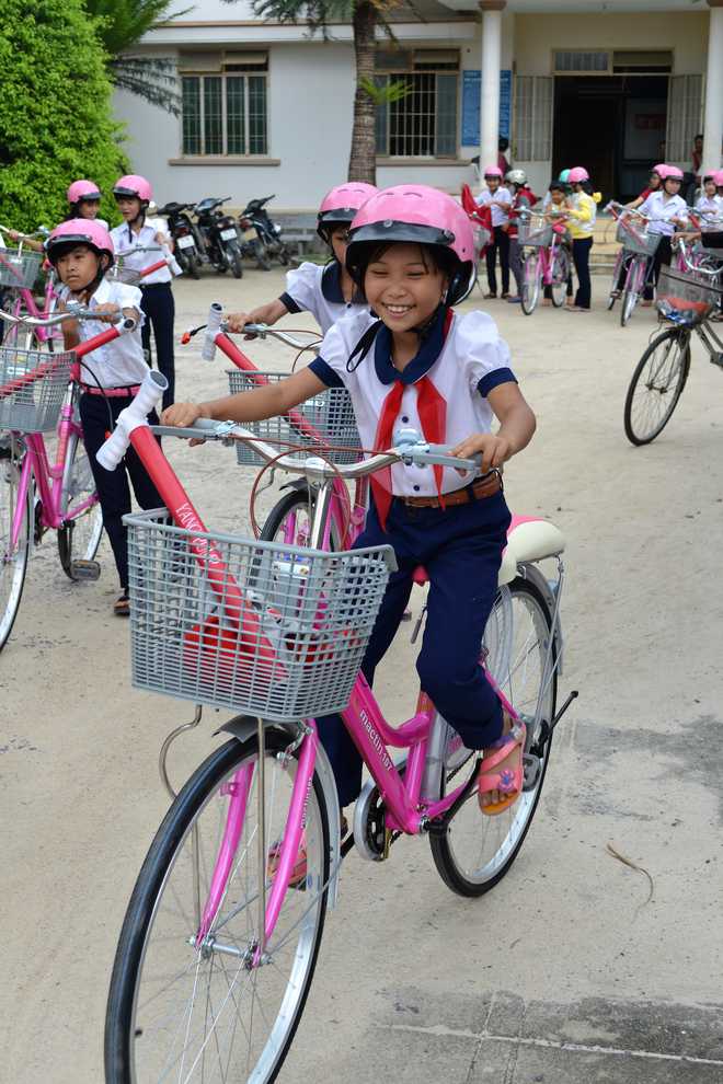 American fifth grader adopted from Vietnam raise money to purchase bikes for girls in home country