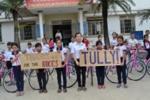 american fifth grader adopted from vietnam raise money to purchase bikes for girls in home country