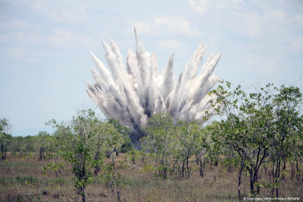 Detonating 750-pound bomb partly dismantled by scrap metal collectors