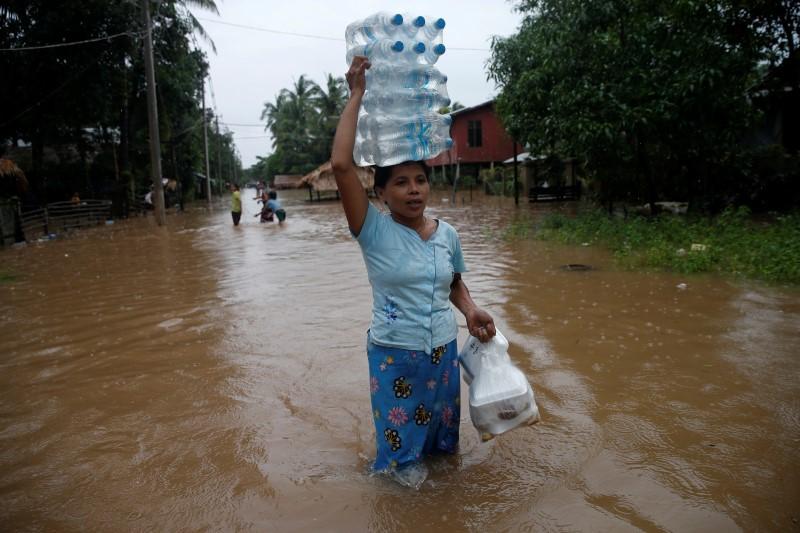 myanmar floods kill two displace tens of thousands