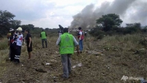 97 injured as mexican plane crashes at airport in hail storm