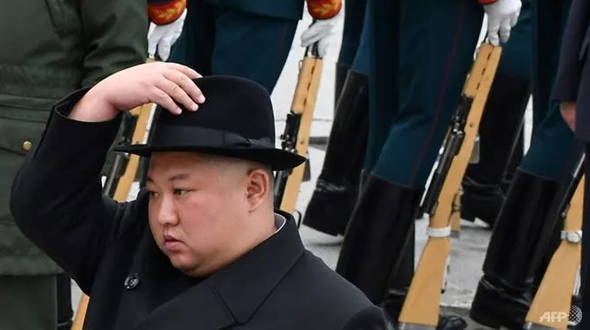 North Korean leader Kim oversees launch of new type of rocket
