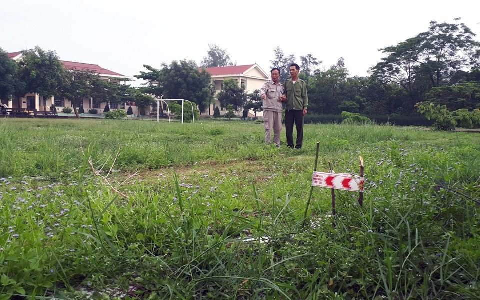 Cluster bomb, in Quang Tri’s school football field, safely destroyed