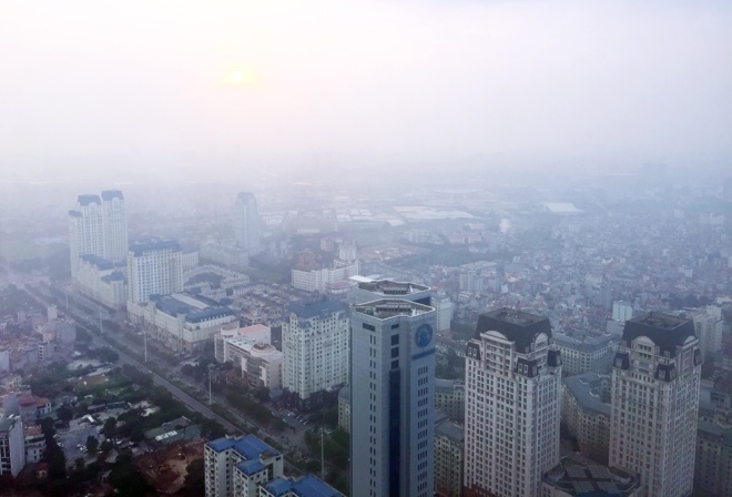 Hanoi suburbs covered by smoke from burnt straw