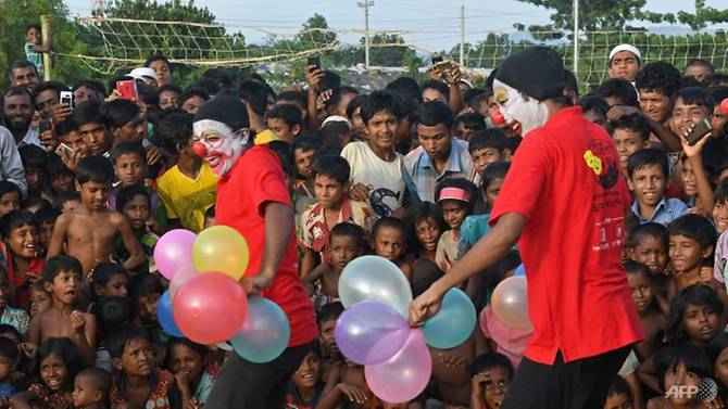 clowns bring laughter to traumatised rohingya children