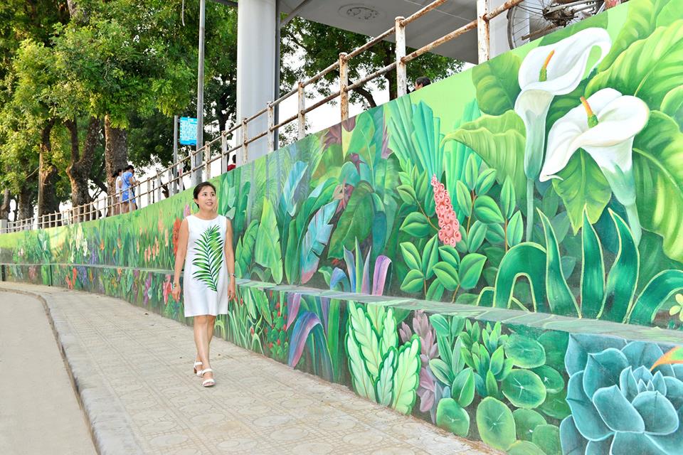 mural painting displays four seasons of hanois flowers