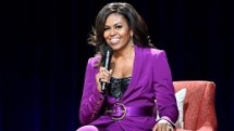 michelle obama reveals she will visit vietnam this december to promote girls education